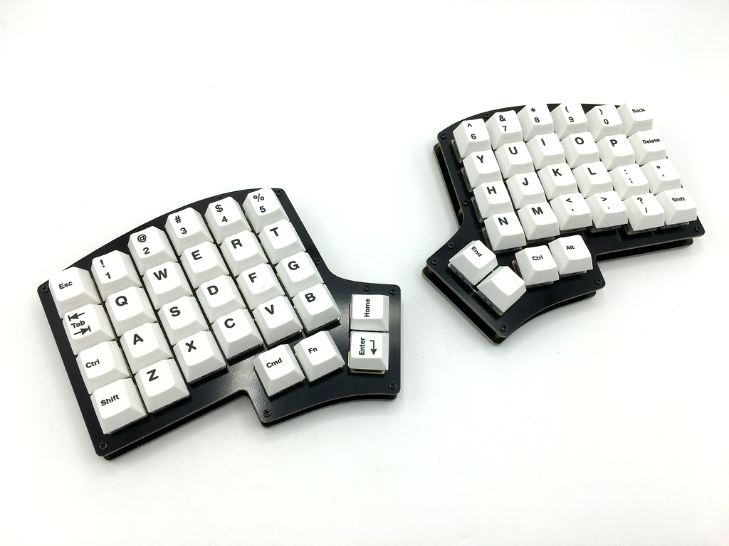 Iris keyboard with cherry-profile Icebergo keycaps that match the default key layout of the keyboard.