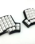 Iris keyboard with cherry-profile Icebergo keycaps that match the default key layout of the keyboard.