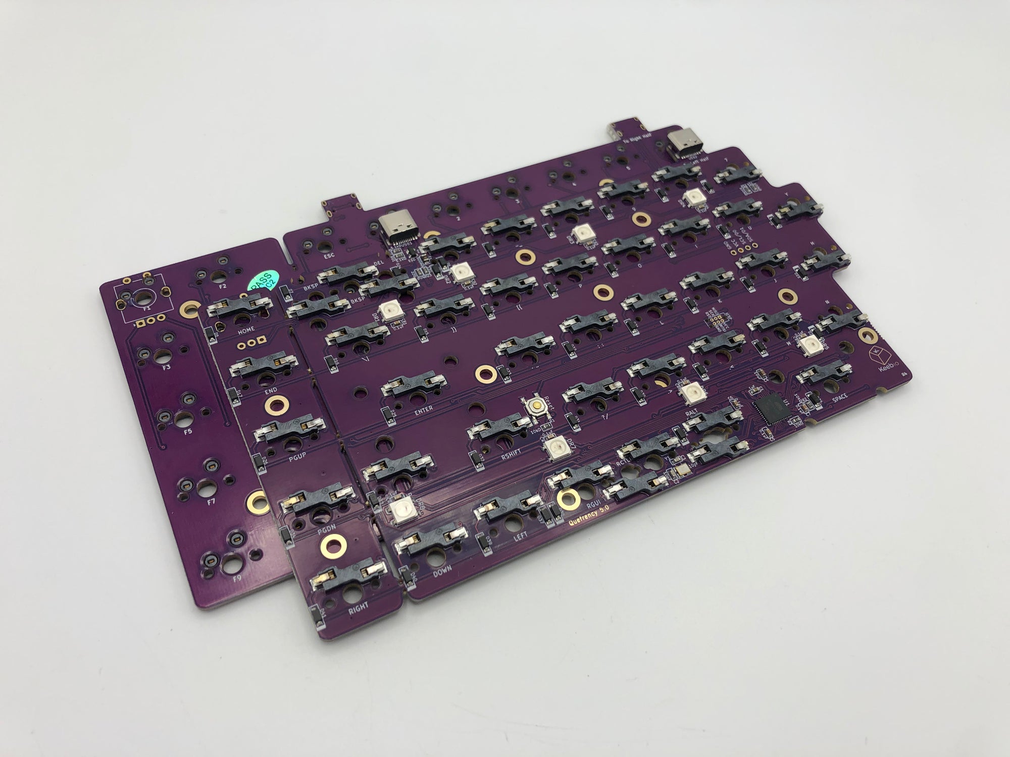 Bare Quefrency PCB halves stacked together.