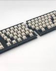 Quefrency keyboard built with white switches and no keycaps.