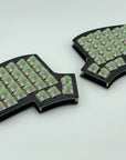 Iris keyboard built with black FR4 plates, Box Jade switches, and no keycaps.