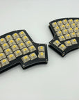 Iris keyboard built with black FR4 plates, Gateron yellow switches, and no keycaps.
