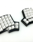 Iris keyboard with cherry-profile Icebergo keycaps that match the default key layout of the keyboard. 