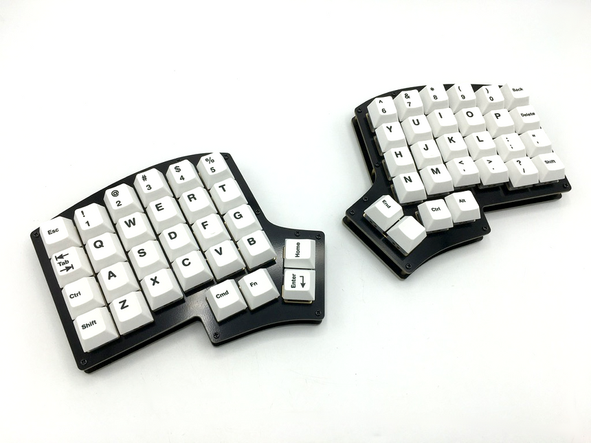 Iris keyboard with cherry-profile Icebergo keycaps that match the default key layout of the keyboard. 