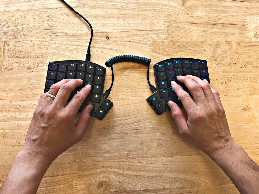 Split keyboard: each hand sits straight, at shoulder width