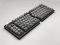 Fully built Sinc keyboard with git themed keycaps.